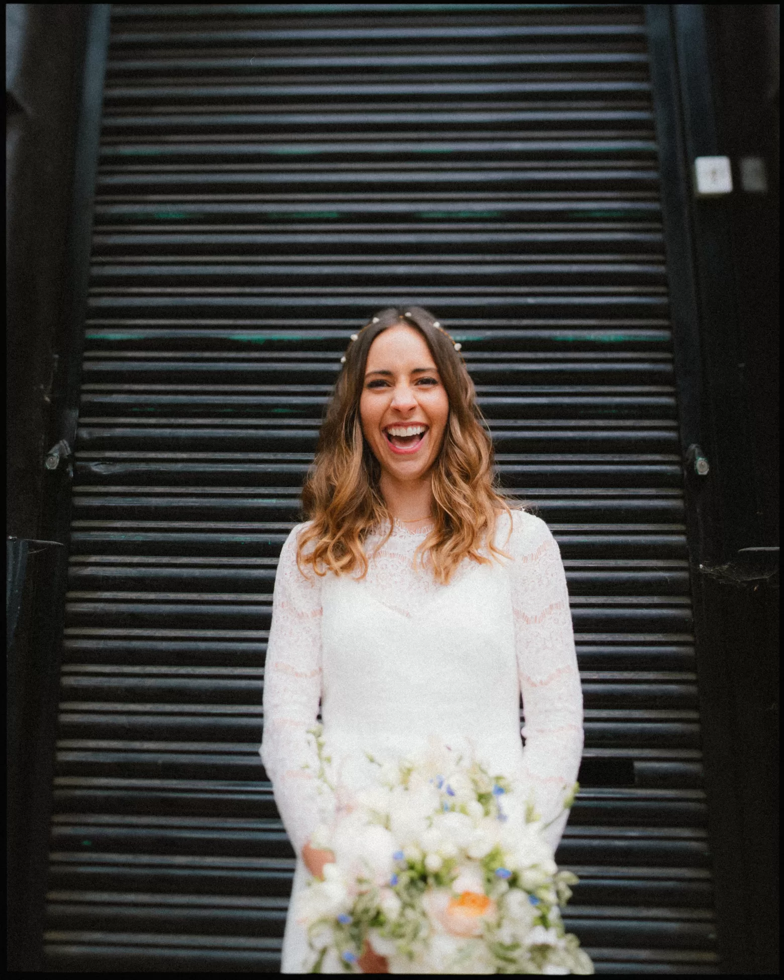 Happy bride portrait captured by alternative wedding photographer Dale Weeks
London